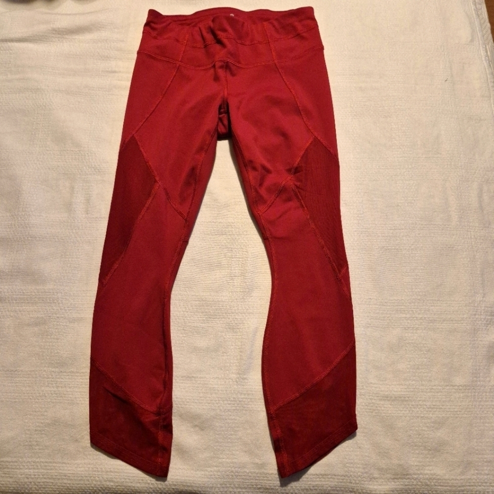 Athleta women's size XS deep red cropped pants with mesh leg inserts VGUC
